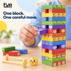 Hand carefully pushing out a block from a wooden stacking tower