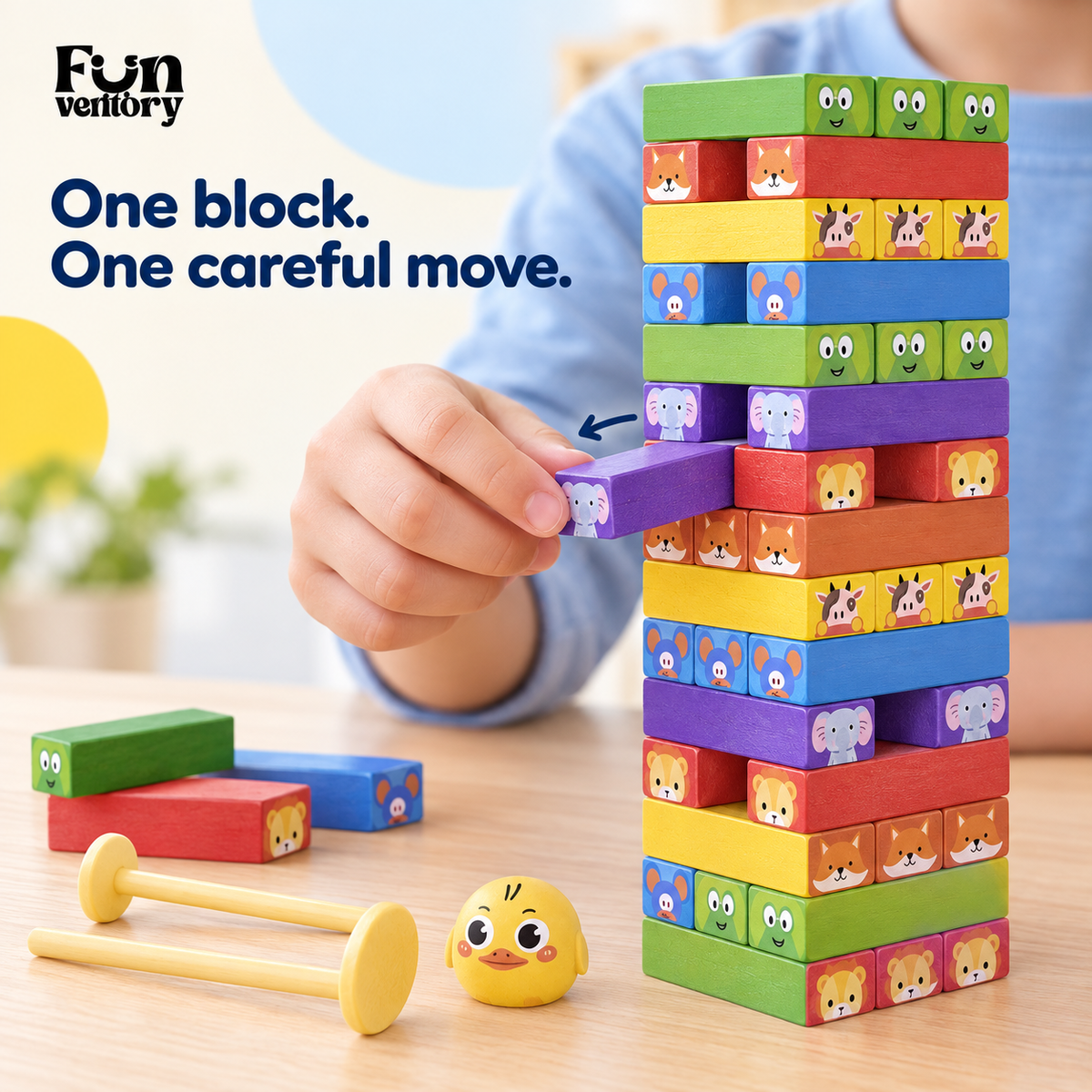 Hand carefully pushing out a block from a wooden stacking tower