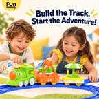 Two children building the track for an electric circus train