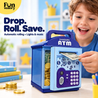 Boy feeding a note into a blue kids ATM money bank