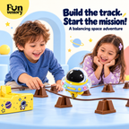Two children building the track for a balancing space robot