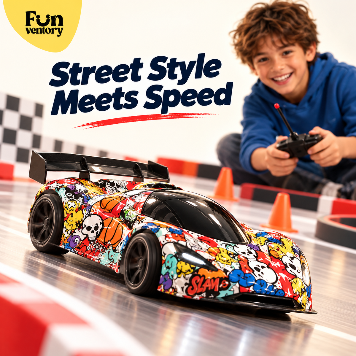 Boy racing a graffiti remote control sports car